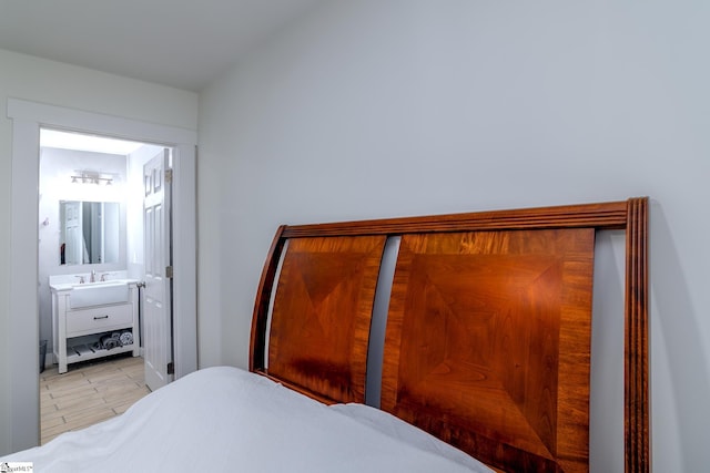 bedroom featuring connected bathroom