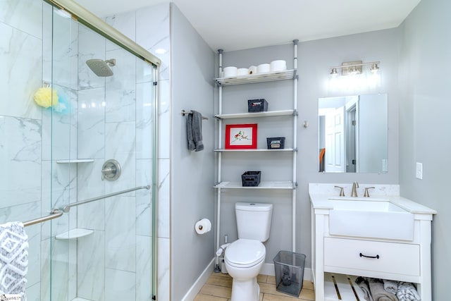 bathroom with vanity, toilet, and walk in shower