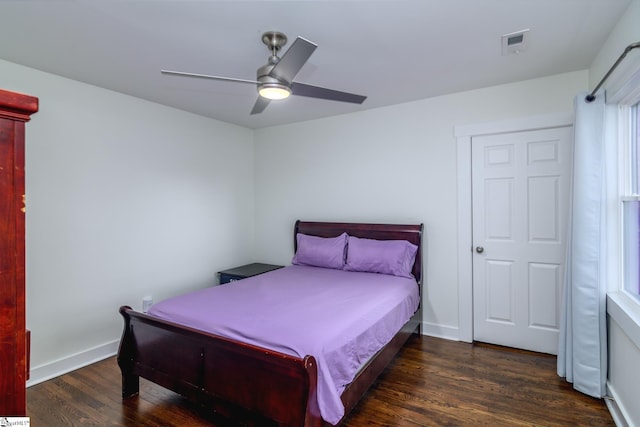 bedroom featuring ceiling fan, dark hardwood / wood-style floors, and billiards