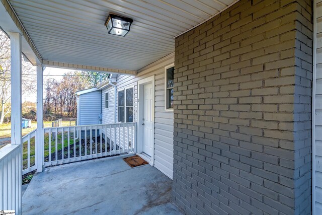 exterior space featuring covered porch