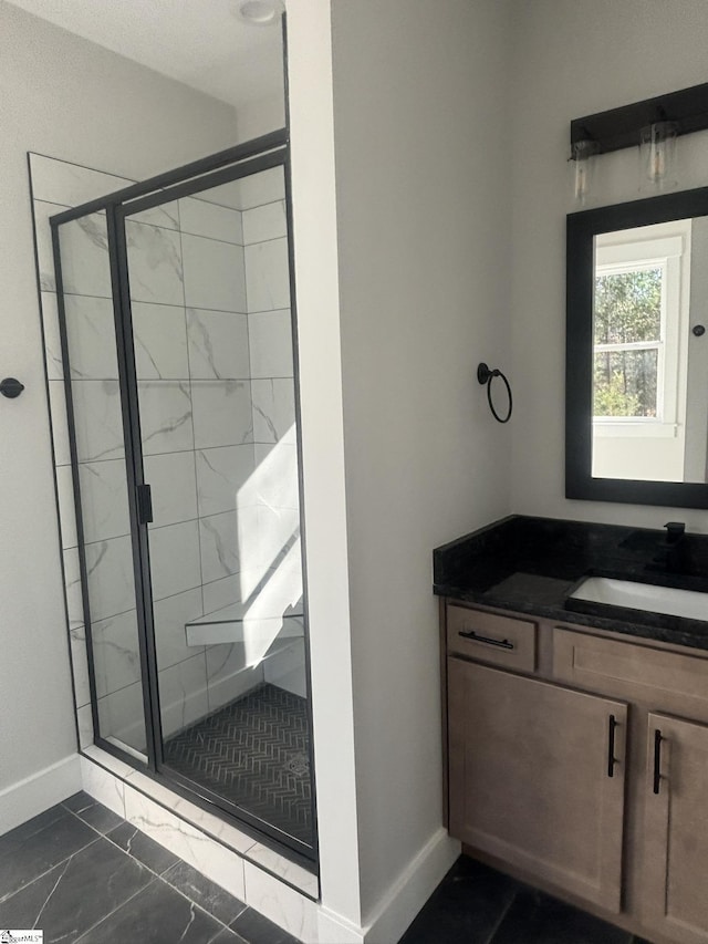 bathroom with vanity and walk in shower