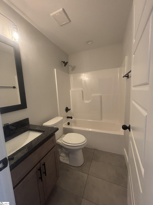 full bathroom with tile patterned flooring, vanity, toilet, and shower / bathtub combination