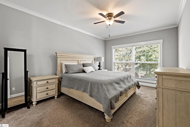 bedroom with carpet flooring, ceiling fan, and crown molding