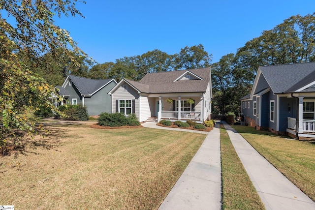 view of front of house featuring a front yard and a porch