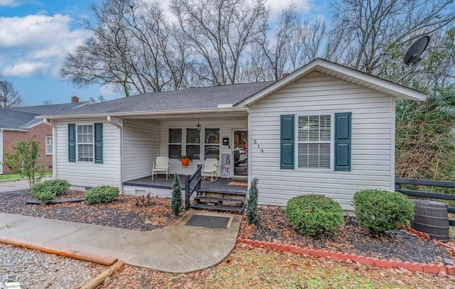 single story home featuring covered porch