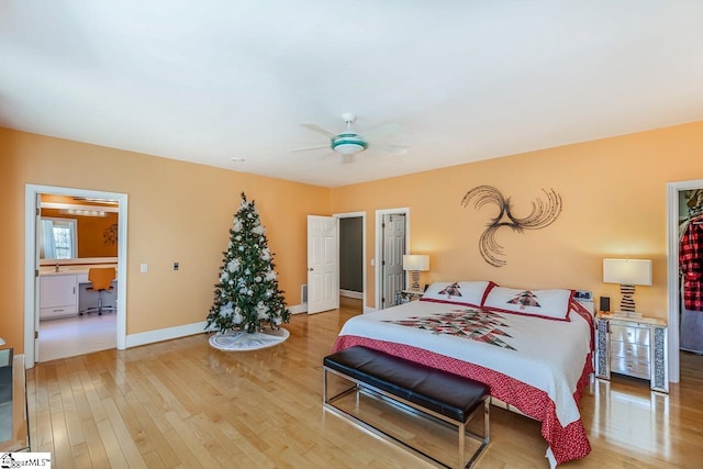 bedroom with ceiling fan and hardwood / wood-style floors