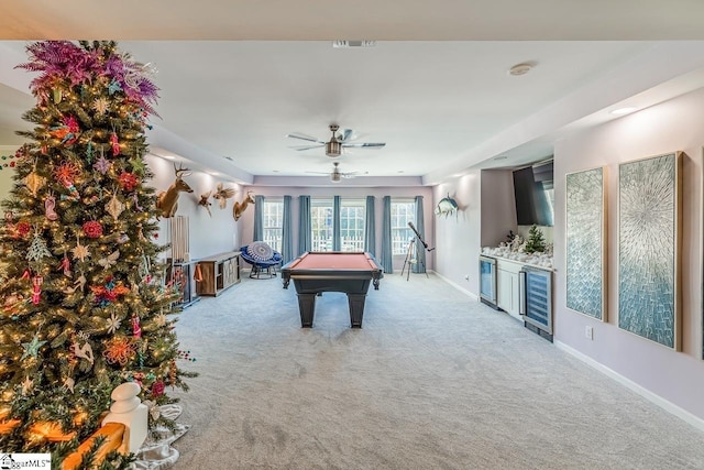 rec room with light colored carpet, wine cooler, ceiling fan, and billiards