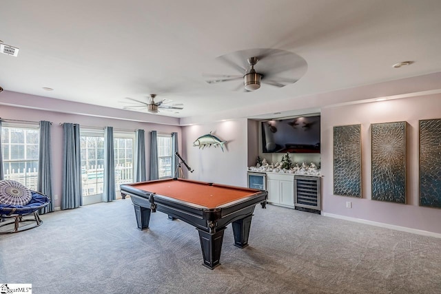 recreation room with ceiling fan, wine cooler, billiards, light colored carpet, and bar