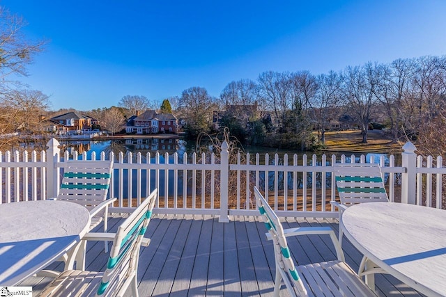 deck featuring a water view