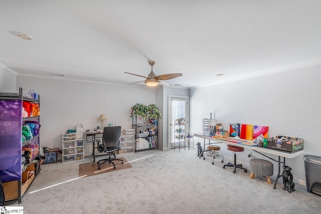 office space with ceiling fan, carpet floors, and ornamental molding