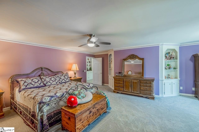 bedroom featuring light carpet, ceiling fan, and ornamental molding