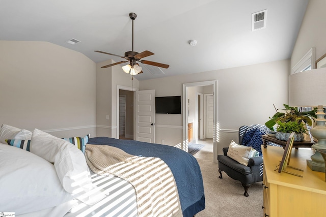 bedroom featuring light carpet, ceiling fan, and lofted ceiling