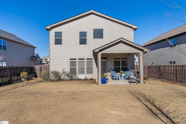 rear view of house with a patio area