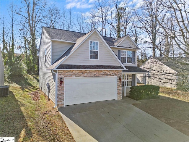 view of front facade featuring a garage, central air condition unit, and a front yard