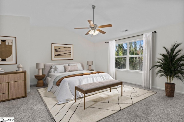 carpeted bedroom with ceiling fan and lofted ceiling