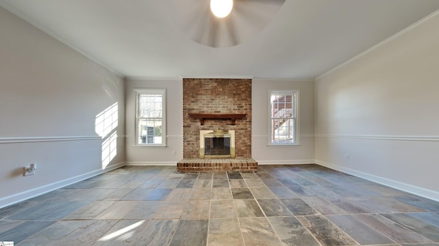 unfurnished living room with ceiling fan, a fireplace, and ornamental molding