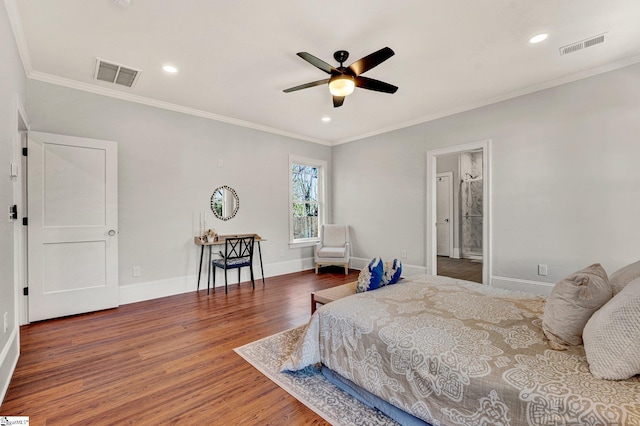 bedroom with ornamental molding, ensuite bath, ceiling fan, and dark wood-type flooring