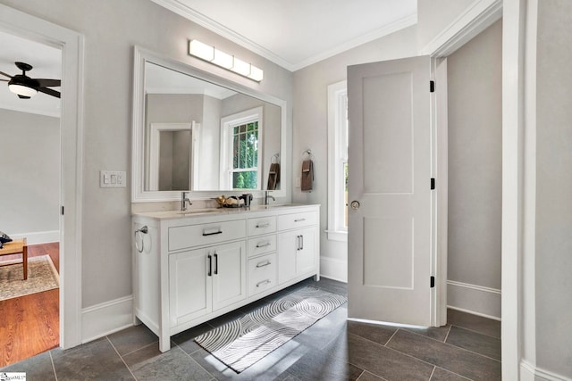 bathroom featuring vanity, ceiling fan, and ornamental molding