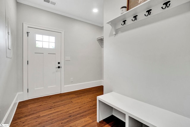 mudroom with dark hardwood / wood-style floors and crown molding