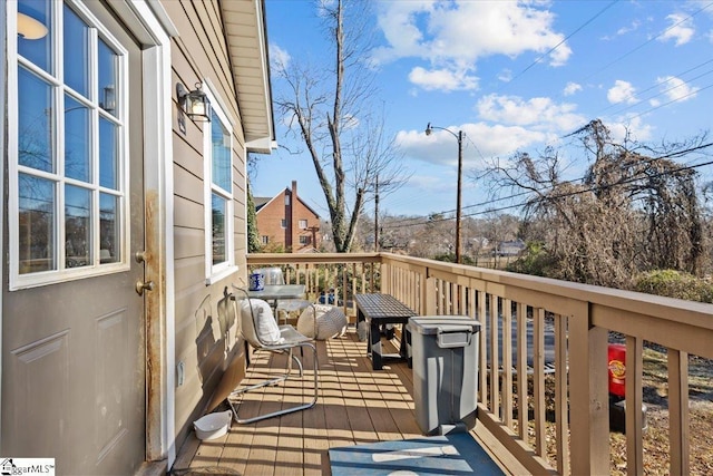 wooden balcony featuring a wooden deck