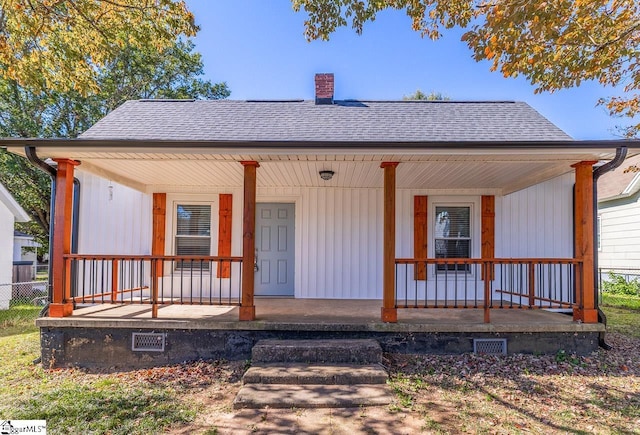 view of front of property featuring covered porch