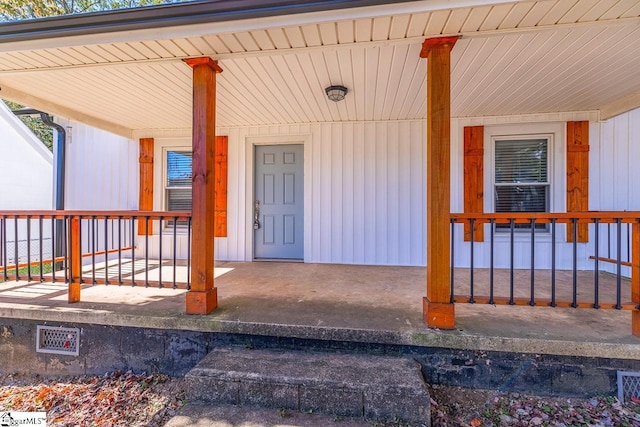 entrance to property with a porch