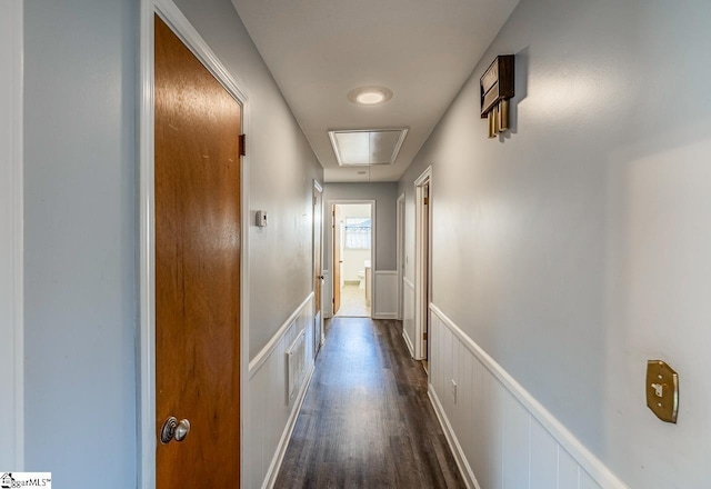 corridor featuring dark hardwood / wood-style floors