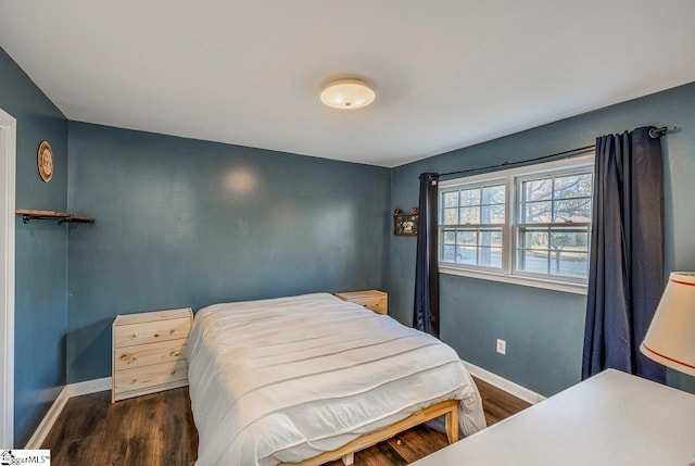 bedroom featuring dark hardwood / wood-style floors