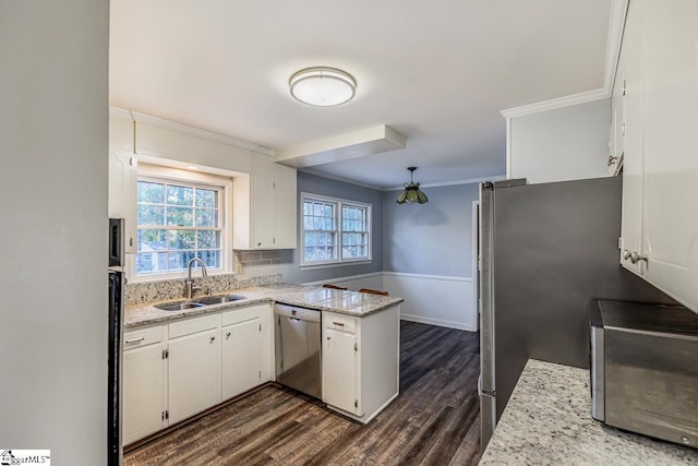 kitchen with white cabinets, sink, and appliances with stainless steel finishes