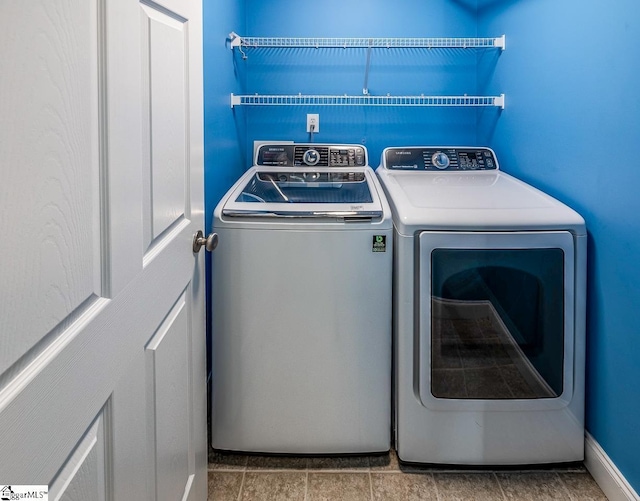 laundry area featuring washer and clothes dryer