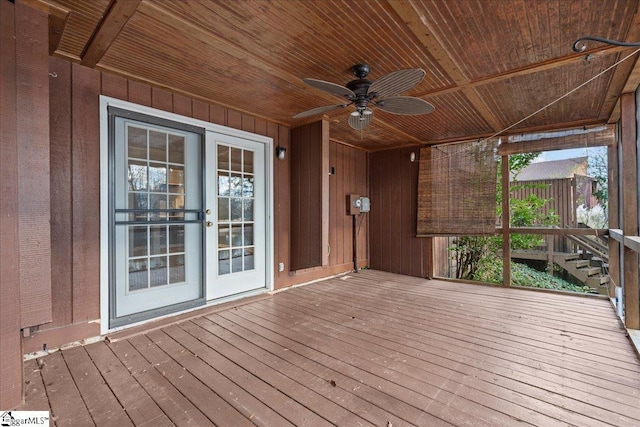 wooden deck with ceiling fan