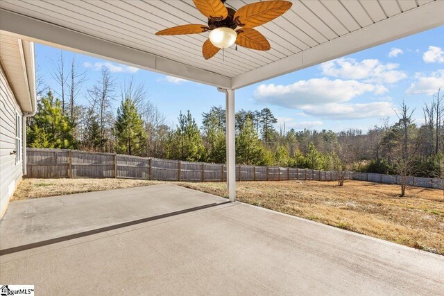 view of patio featuring ceiling fan