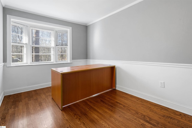 unfurnished office with dark hardwood / wood-style flooring and crown molding