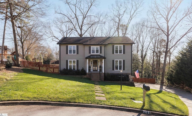 view of front of home with a front lawn