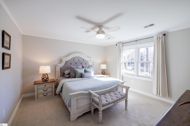 bedroom with ceiling fan and light carpet