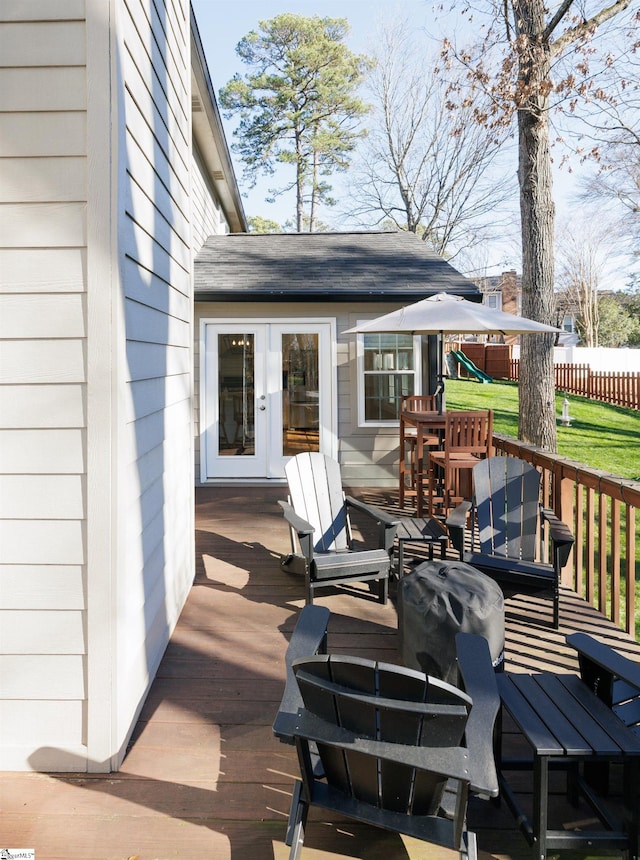 wooden terrace featuring french doors