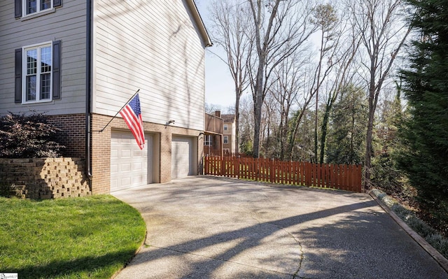 view of side of property featuring a garage