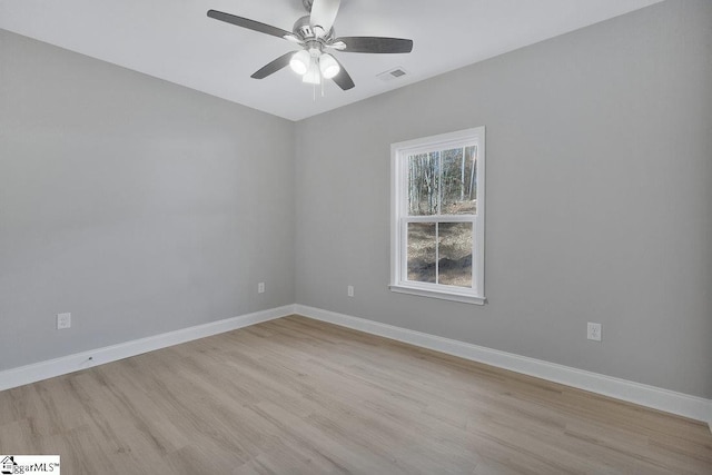 unfurnished room featuring ceiling fan and light hardwood / wood-style flooring