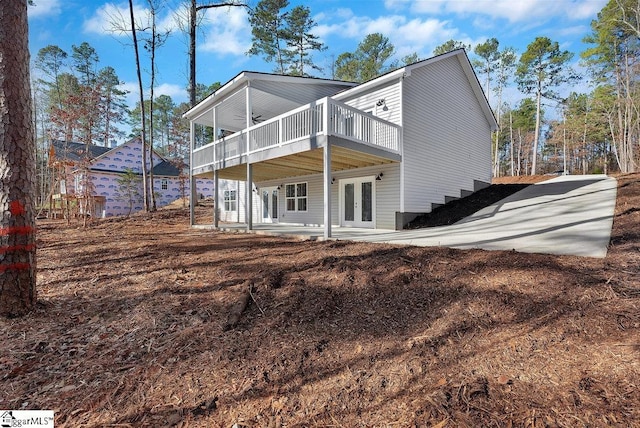 back of house featuring french doors