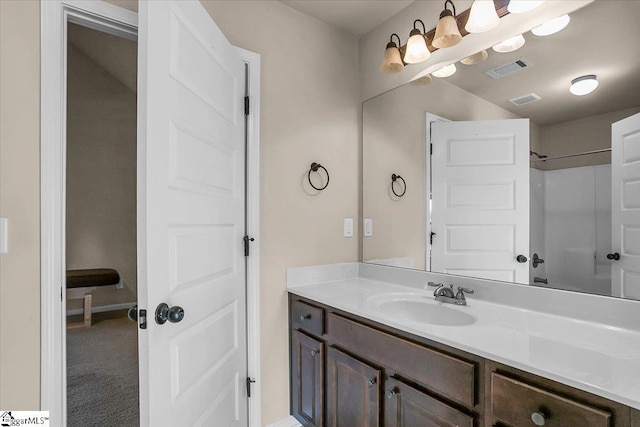 bathroom featuring vanity and walk in shower