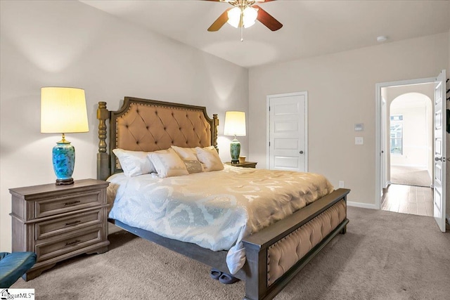 bedroom with ceiling fan and carpet floors