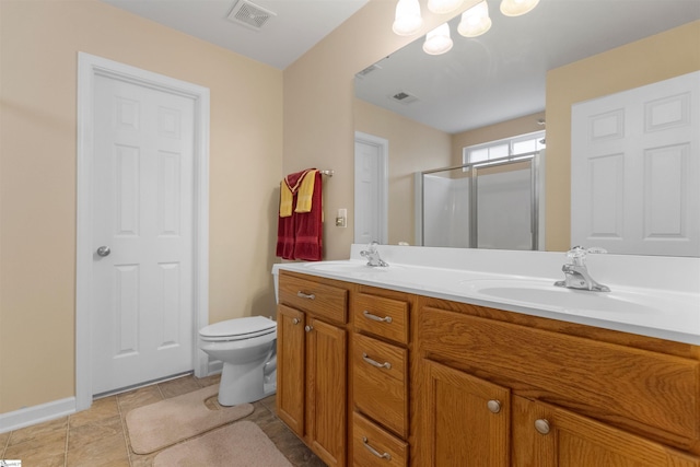 bathroom featuring vanity, toilet, and walk in shower