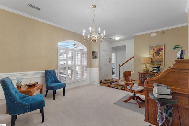 sitting room with light colored carpet, a notable chandelier, and ornamental molding