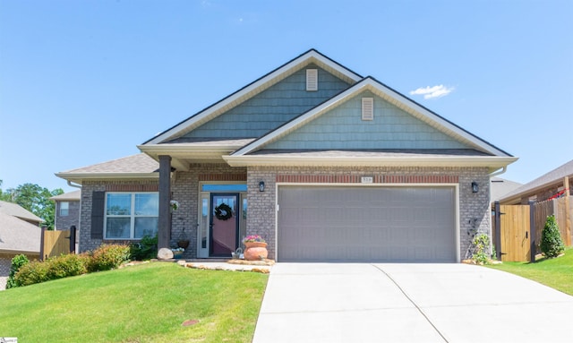 view of front facade with a front lawn and a garage