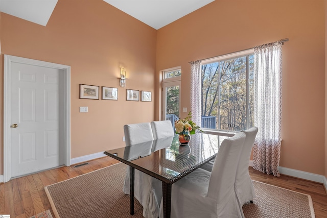 dining area featuring light wood-type flooring