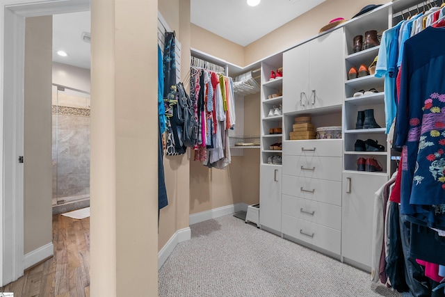 walk in closet featuring light wood-type flooring