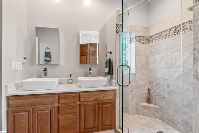 bathroom featuring vanity and walk in shower