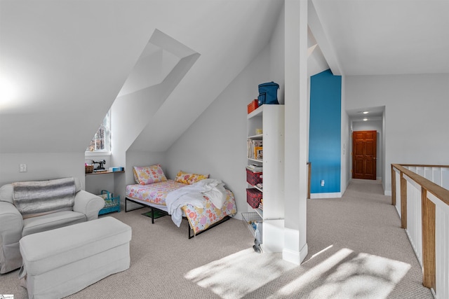 bedroom featuring light carpet and lofted ceiling