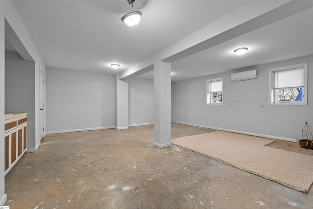 basement featuring a wall unit AC