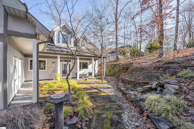 view of yard featuring a porch